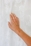 The Still Beaded Hand Chain